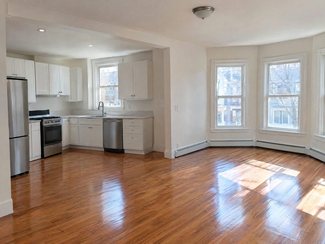 Empty bright apartment with the kitchen wiped and floors done